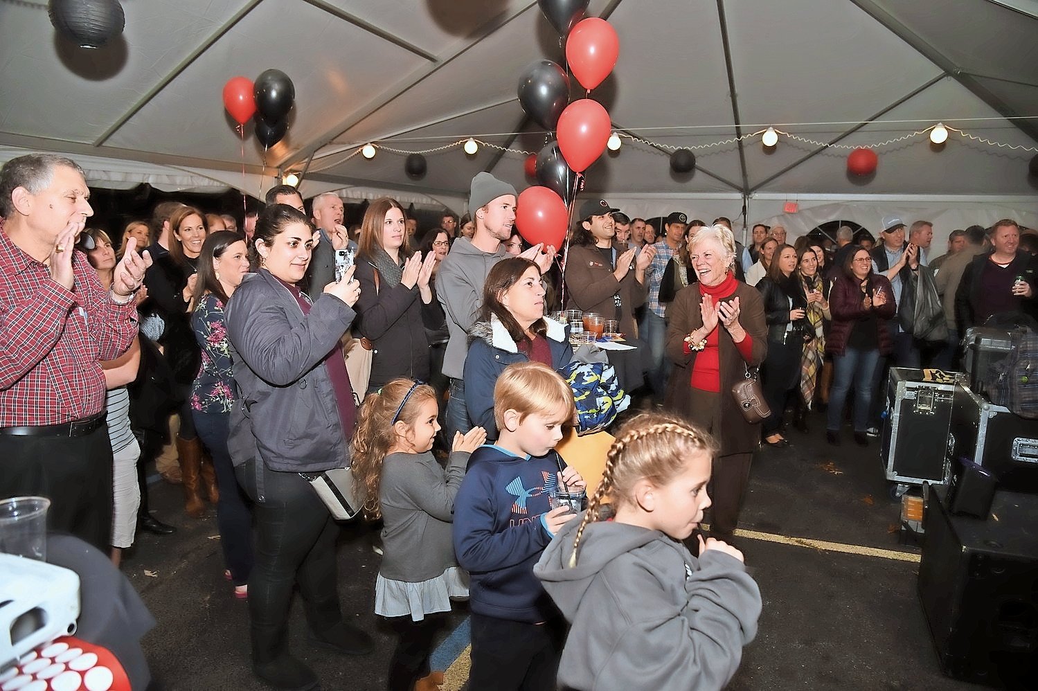 Community members gathered last year for the event in a large, heated tent, and the fundraiser will once again be held outside St. Mark’s Church on Hempstead Avenue.