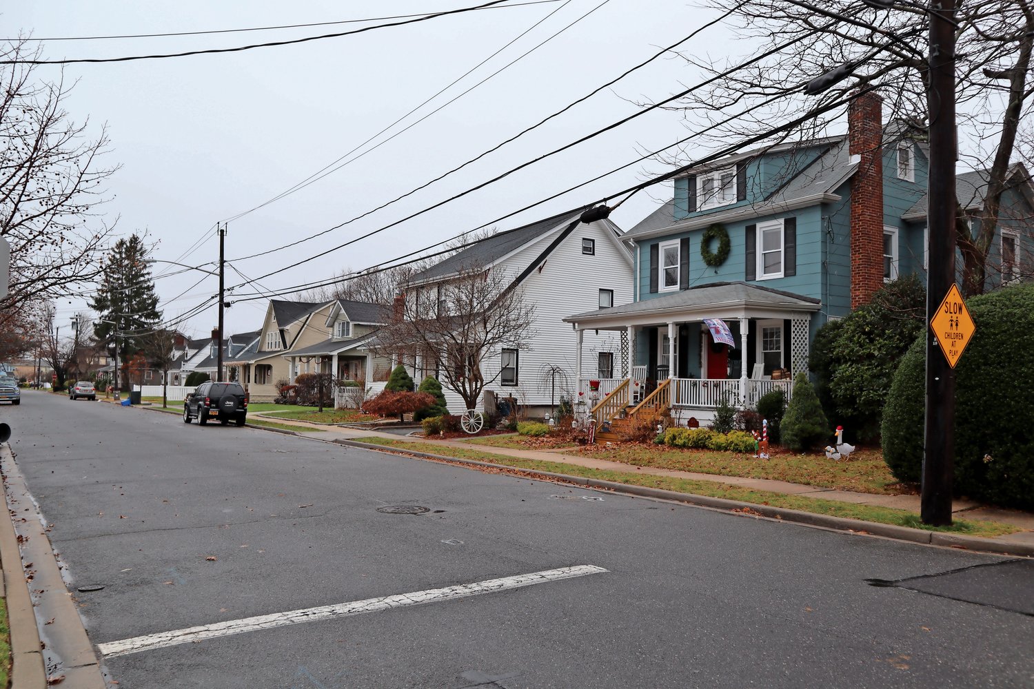 . . . while homes in Rockville Centre, above, average more than $650,000. The Hempstead district has a 2 percent white enrollment, compared with its neighbor’s 77 percent white student body.