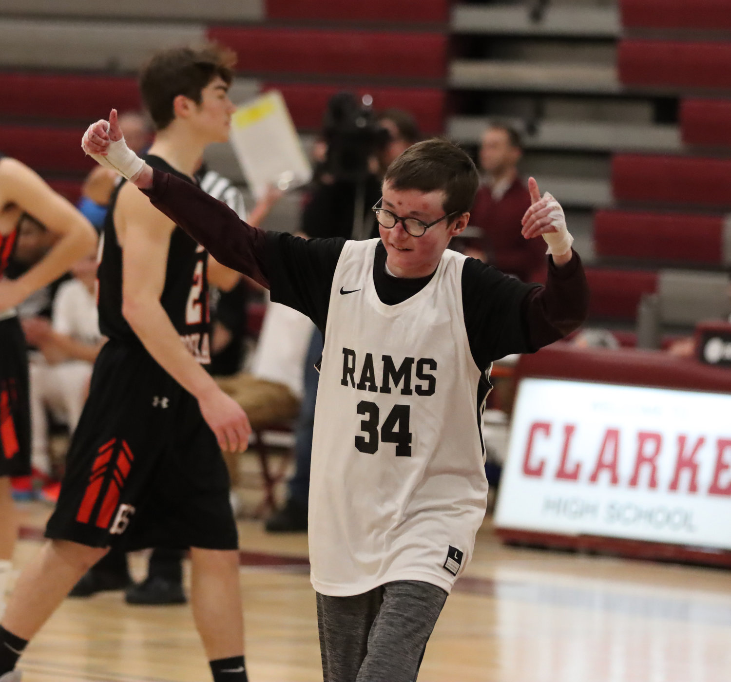 Robbie Twible ran onto the court when W.T. Clarke High School faced off against East Rockaway High School last Friday. The 17-year-old watches the games from the sidelines because he has a life-threatening skin disorder, but this time he shot, and scored.