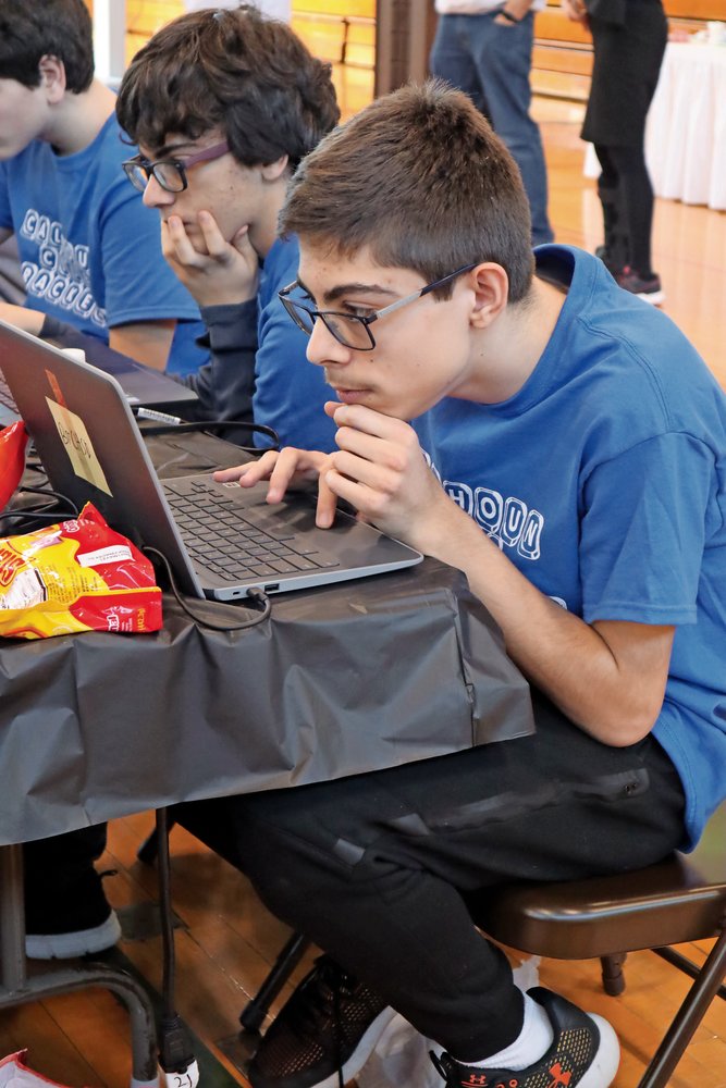 Joe Ciniglio, a member of the “Code Crackers,” helped his team achieve third place in the hours-long competition.