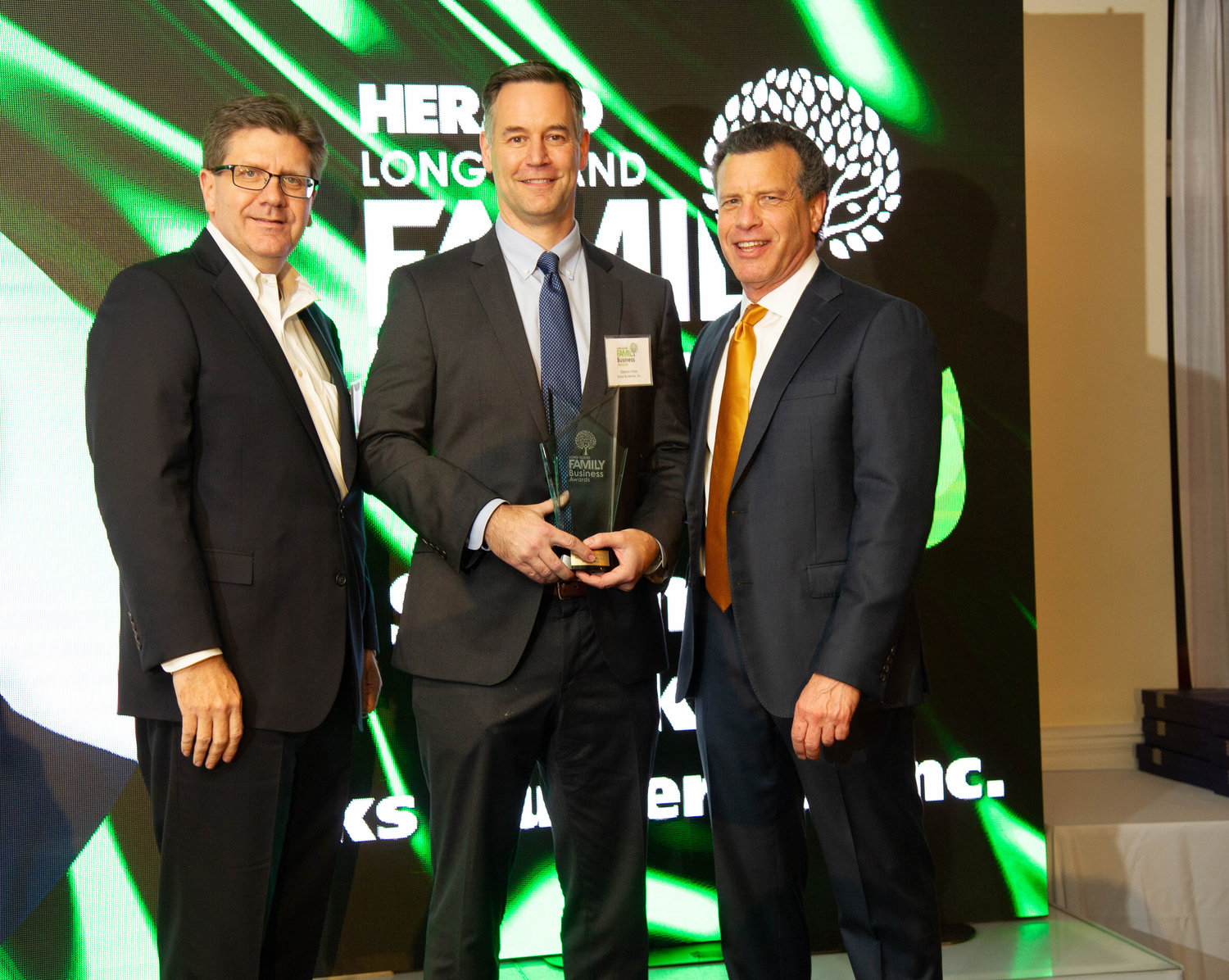 President of Hicks Nurseries Stephen Hicks, center, accepted the Green Legacy Award from Managing Partner of Campolo, Middleton & McCormick, Joe Campolo, left, and CEO and Publisher of Richner Communications, Stuart Richner, right.