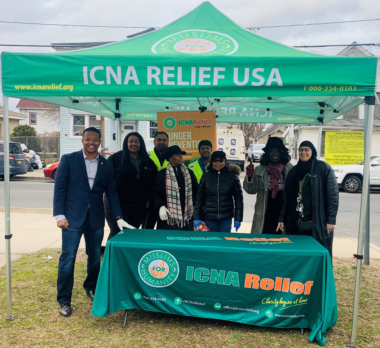 County Legislator Carrié Solages, far left, partnered with Islamic Council of North American Relief and provided 100 families with food supplies in Inwood on March 16.