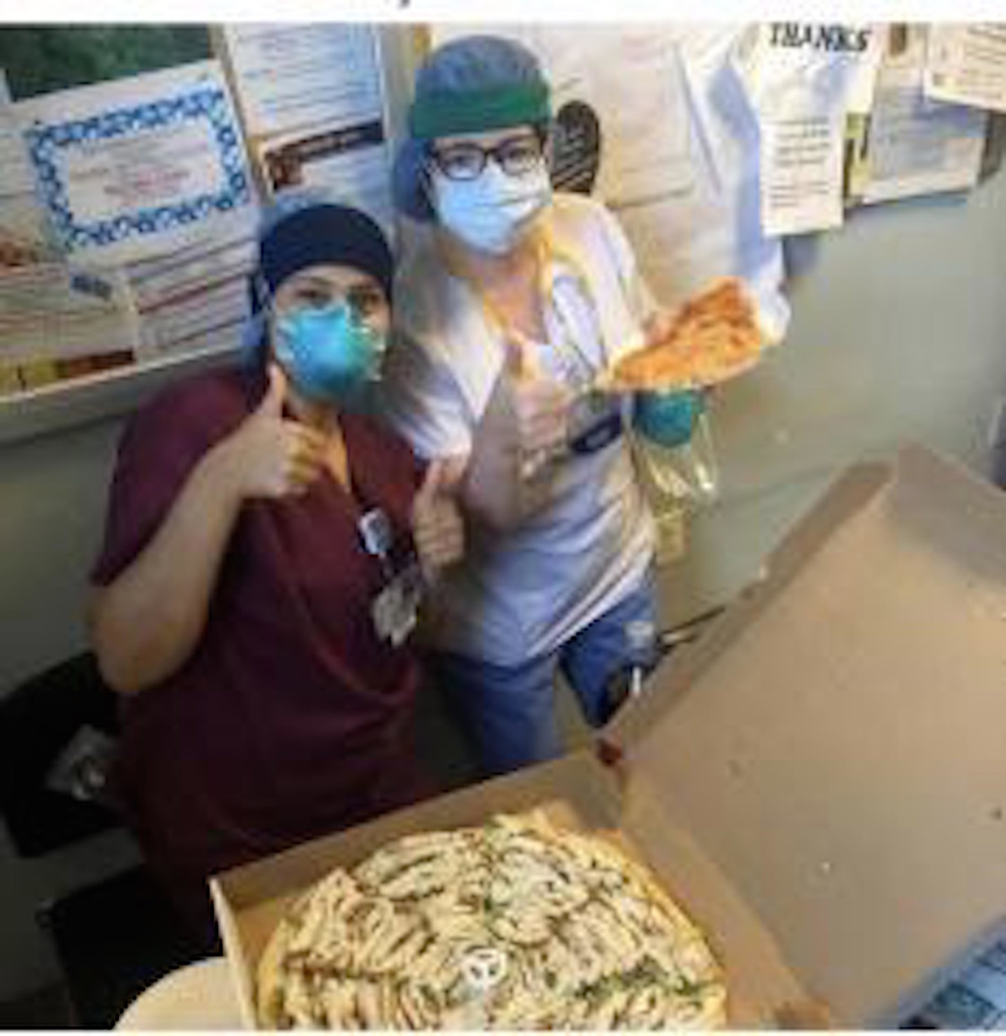 Health care workers at LIJ Valley Stream enjoyed pizza donated by the restaurant.