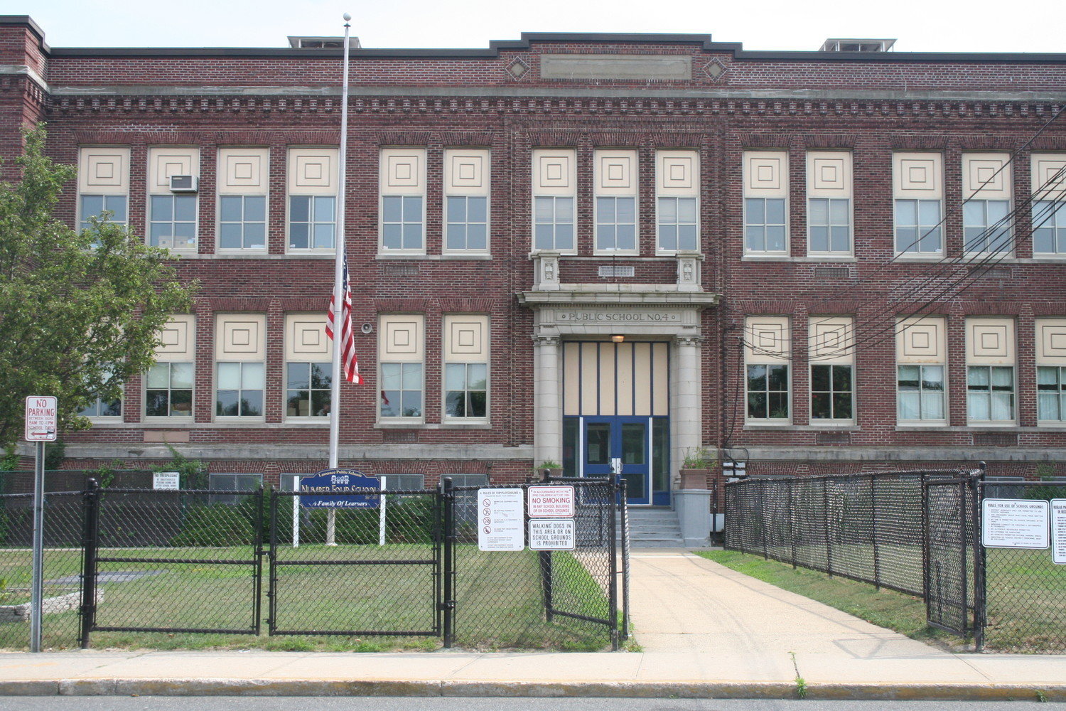The Lawrence School District laid off and furloughed a total of 107 employees as of April 15. Above, the Number four School, one of two locations where meals are distributed.