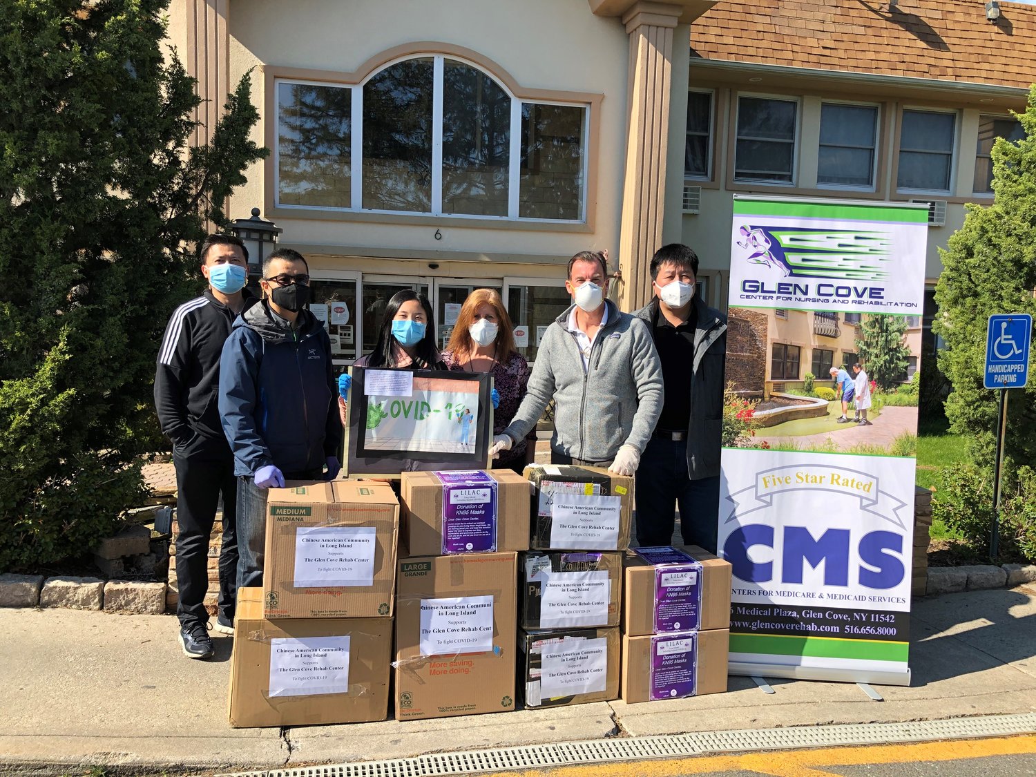 Congressman Tom Suozzi, high school student Sabrina Guo and members of the Long Island Chinese American Association provided aid to Glen Cove Center for Nursing and Rehabilitation.