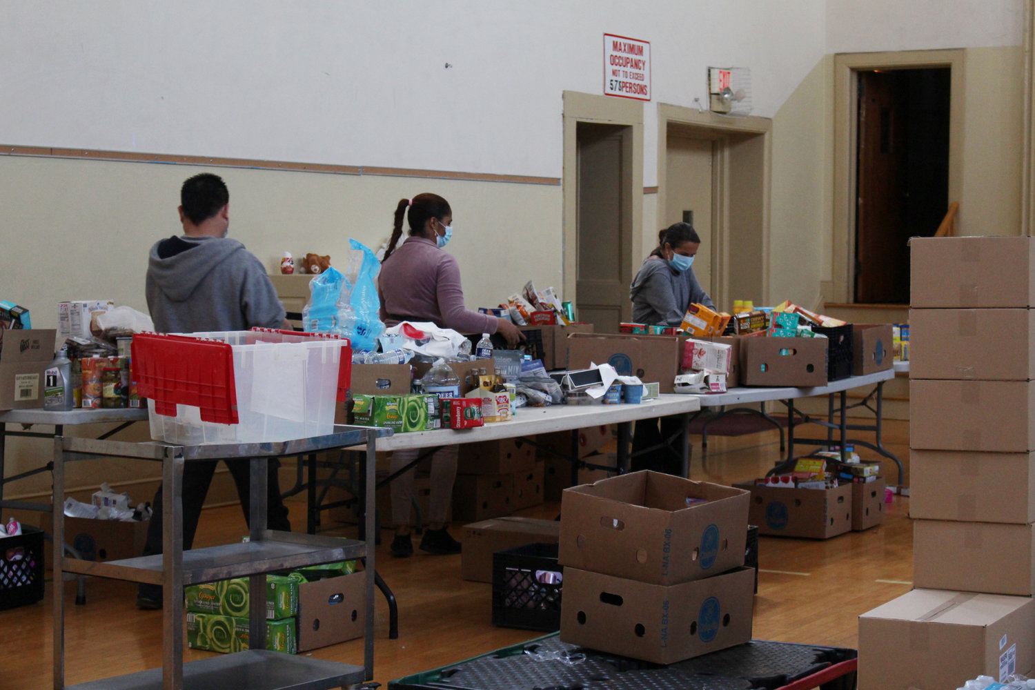 Boxes of food were stored in the parish gymnasium.