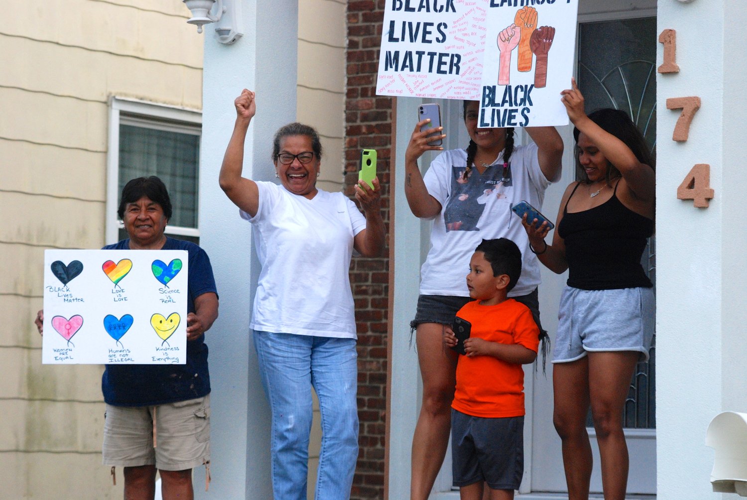 The Cordova family, on Babylon Turnpike in Merrick, cheered on the protesters.