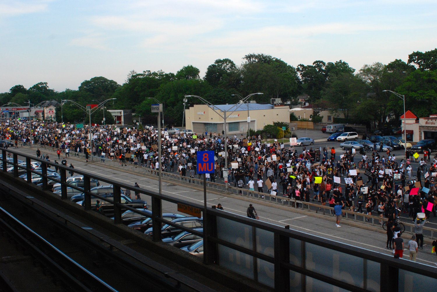 Nassau County police estimated the crowd at 4,000 people. Above, protesters on Sunrise Highway arriving at the Merrick Long Island Rail Road station.