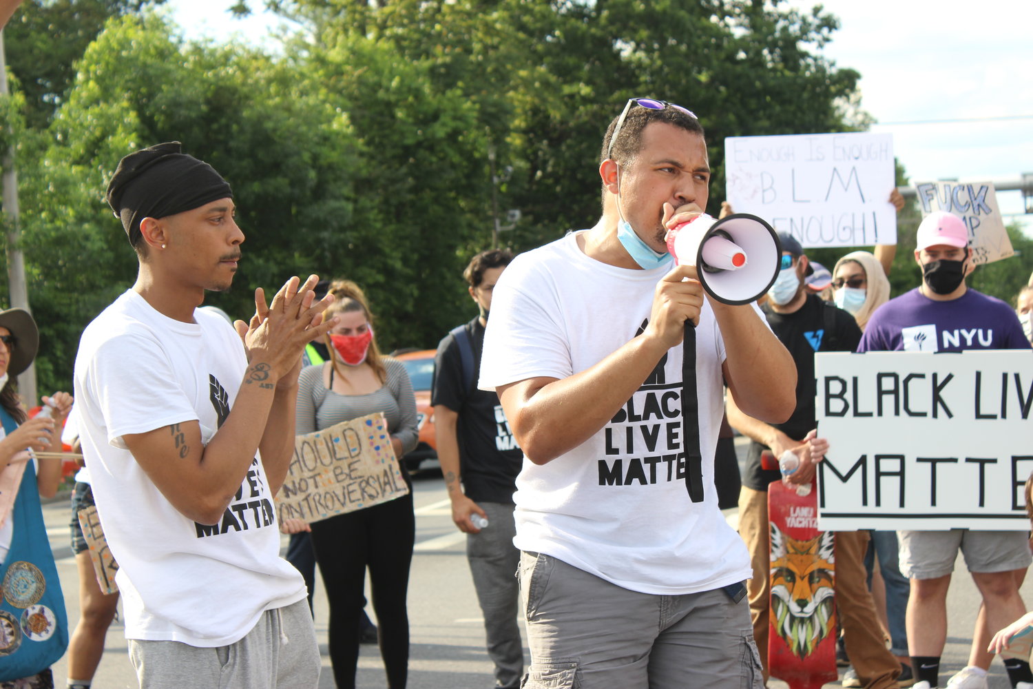 Terrel Tuosto, right, shared with the crowd his experiences with racial profiling and racism from law enforcement. He was with his brother Tiandre.