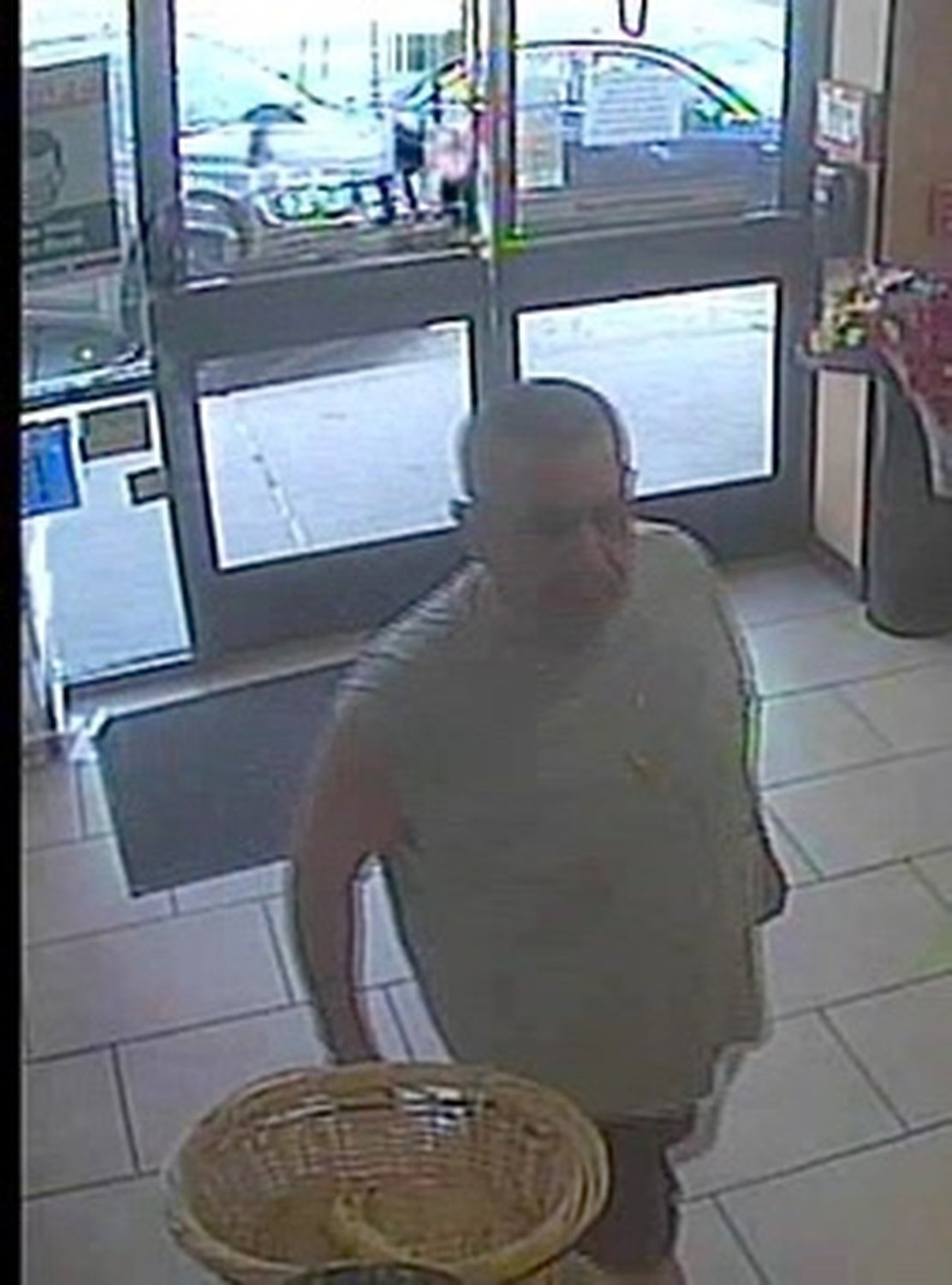 The man that allegedly robbed the 7-Eleven on Mill Road in Hewlett is described by police as white and in his 50s.