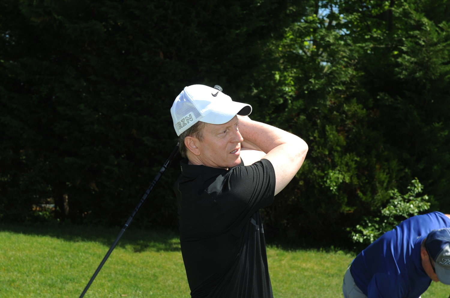Mount Sinai South Nassau hospital has postponed its annual golf outing to Sept. 14. In 2018, board member Lowell Frey followed the flight of his shot at the event.