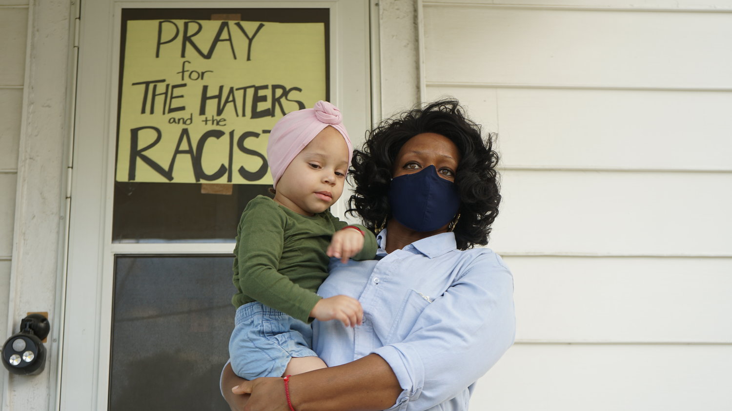 Valley Streamer Jennifer McLeggan with her daughter Immaculate. For the past three years she said she has suffered racially motivated harassment from a trio of neighbors.