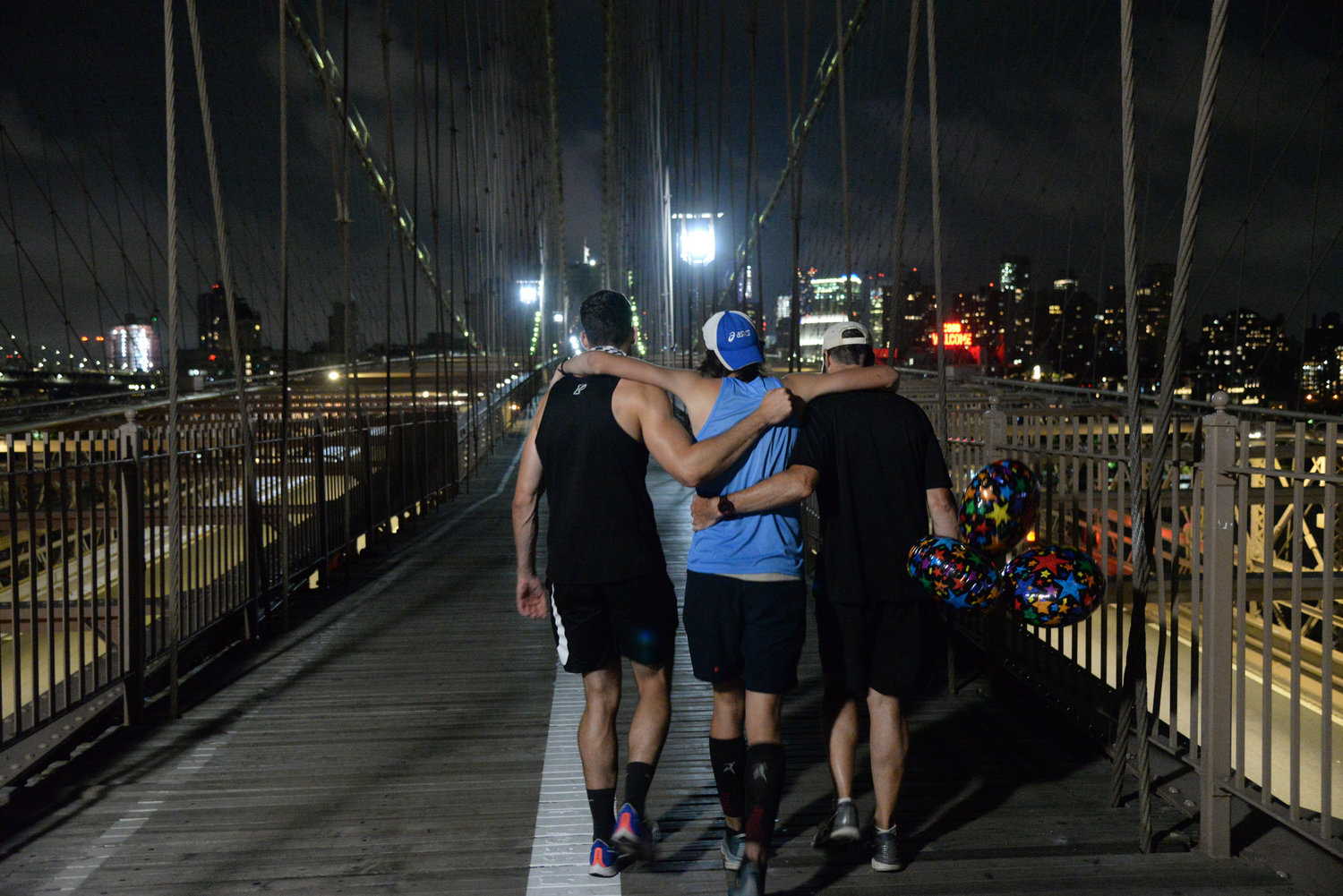 Clifford’s family helped him cross the finish line on the Brooklyn Bridge late Tuesday night.