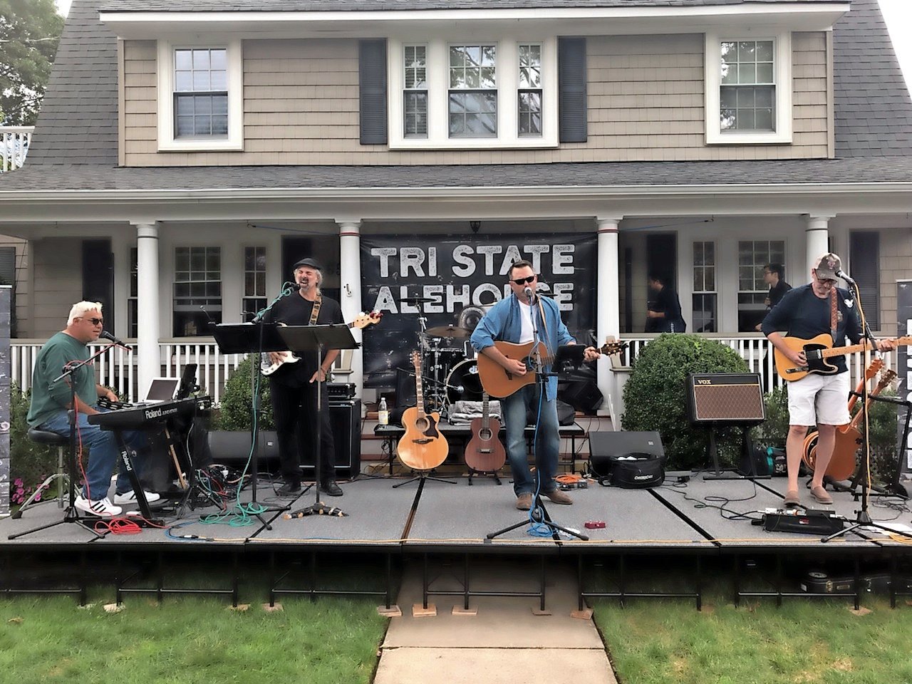 At last year’s inaugural Playing on the Porch, Tri State Alehouse performed on Pine Street.