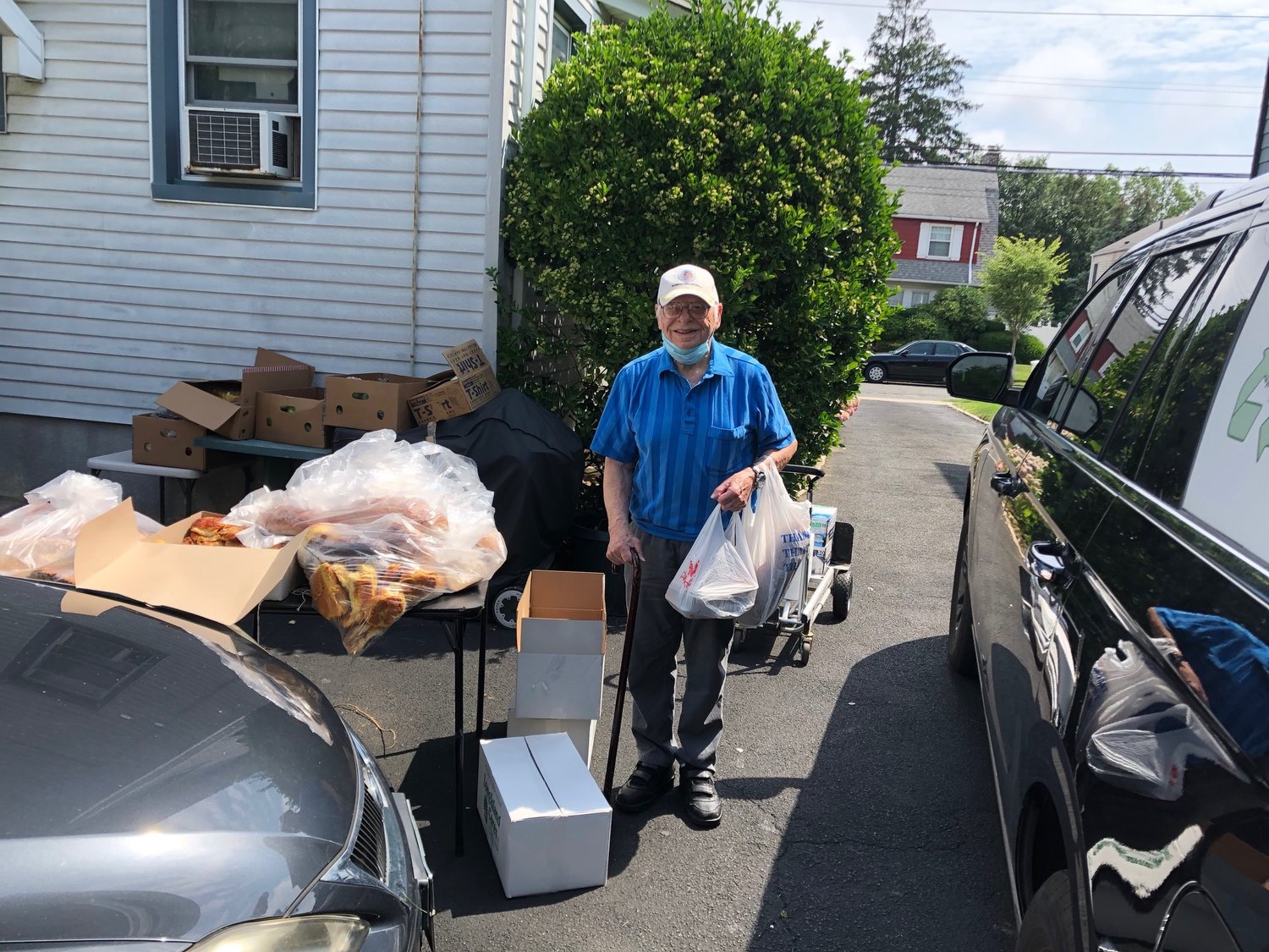 Korean War veteran hero Harry Sidor, 88, picked up food at the Veterans Farmers Market launched by Rock and Wrap It Up!’s Andy Parise Veterans Toolkit.