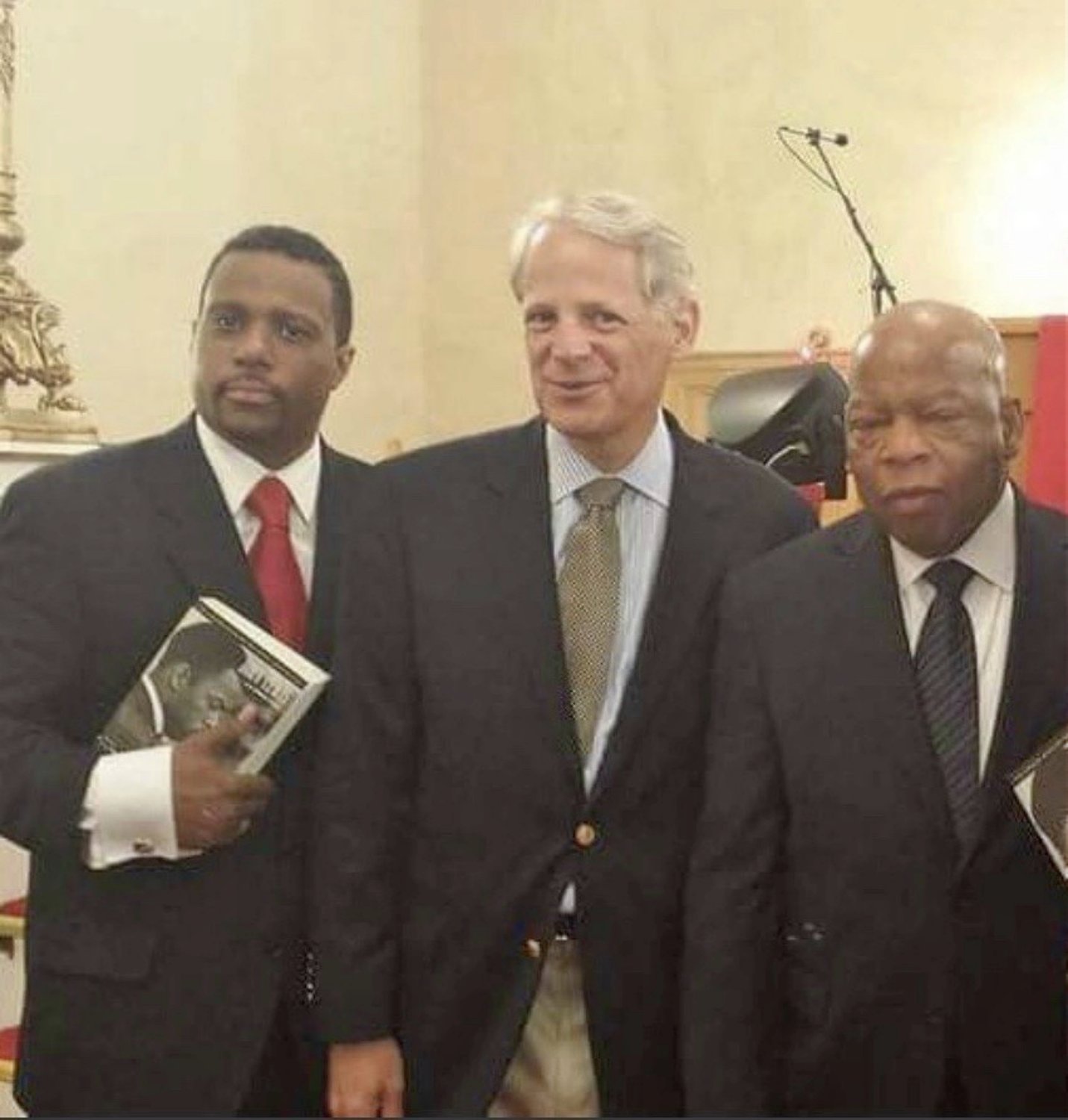 The Rev. Roger Williams, left, former U.S. Rep. Steve Israel and Rep. John Lewis at an event at First Baptist Church of Glen Cove in 2014.