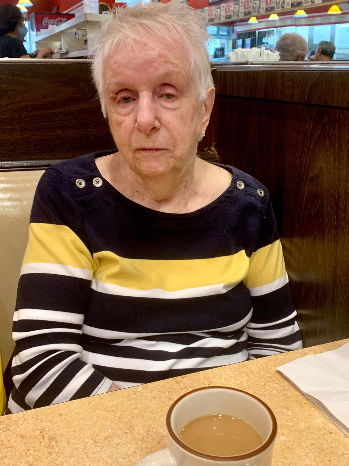 Doris Rykowski, 87, has been eating at Henry’s Confectionary for the past few days with her family because she cannot cook at home due to a lack of electricity.