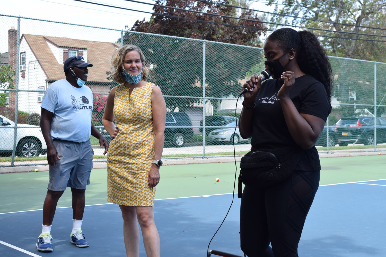 State Assemblywoman Taylor Darling, right, and Nassau County Executive Laura Curran shared their experiences learning tennis from Daniel Burgess.