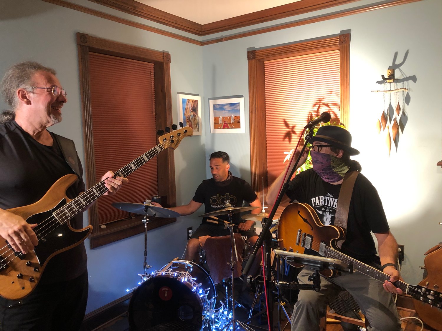 The Dave Diamond band, made up of bassist Craig Pivett, left, drummer Adam Polatov and guitarist Dave Diamond, took the stage as the fourth act in the Still Partners fundraiser to save one of their favorite venues.