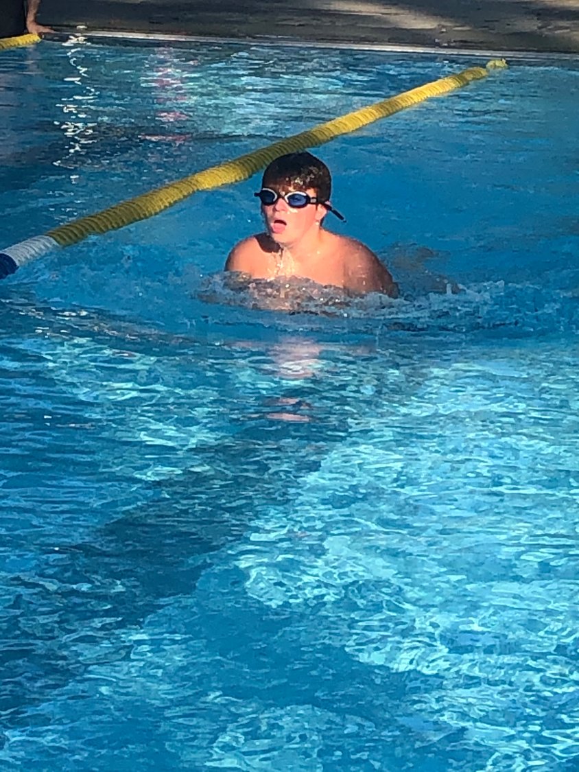 Joseph Wolk was among those who swam a mile in 30 minutes.