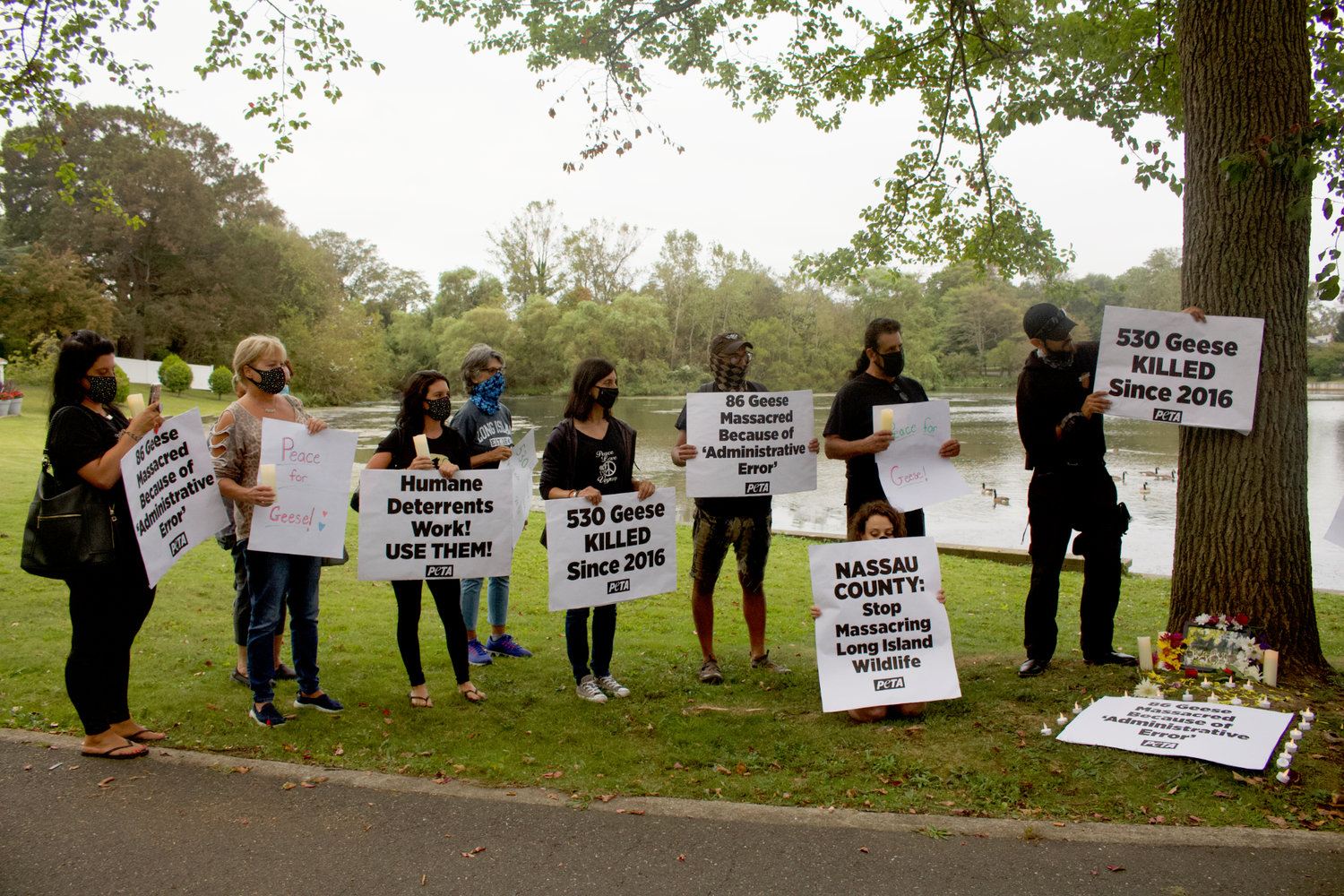Dozens of local residents and animal rights activists gathered in Milburn Pond Park in Baldwin on Sept. 9 for a vigil to pay tribute to the 86 Canada geese that were removed by a federal agency, in error, in June and later killed.