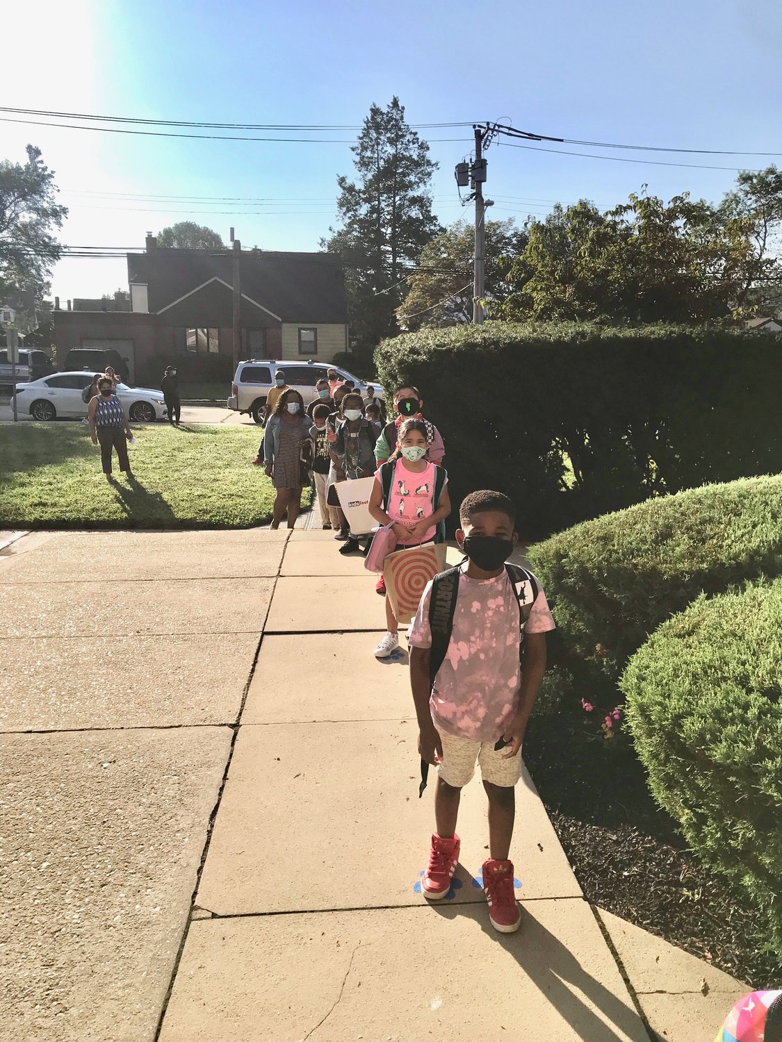 Students lined up at Clear Stream Avenue Elementary School on the morning of Sept. 3 for the first day of school. Parents said that with reduced student density, picking up and dropping off their children has been smoother than usual.