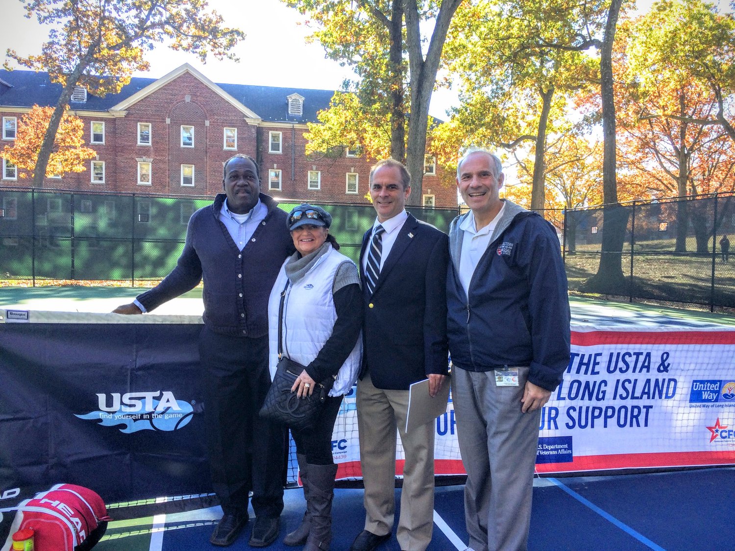 Daniel Burgess, left, was joined by fellow USTA Long Island Region board members Sunny Fishking, Craig Fligstein and Mike Pavlides when Burgess received the Fran Osei Community Service Award in 2018. 