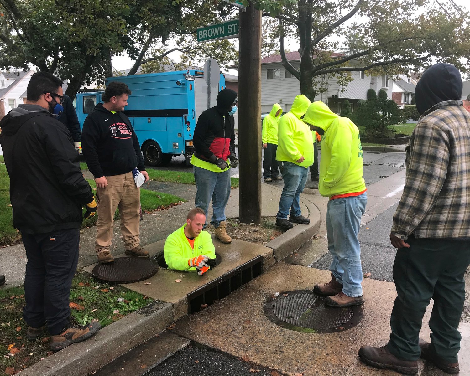 Village highway workers responded to a report of a kitten trapped in a storm drain on Brown Street Tuesday around noon. Worker Chris Sortile entered the drain to rescue the the kitten.