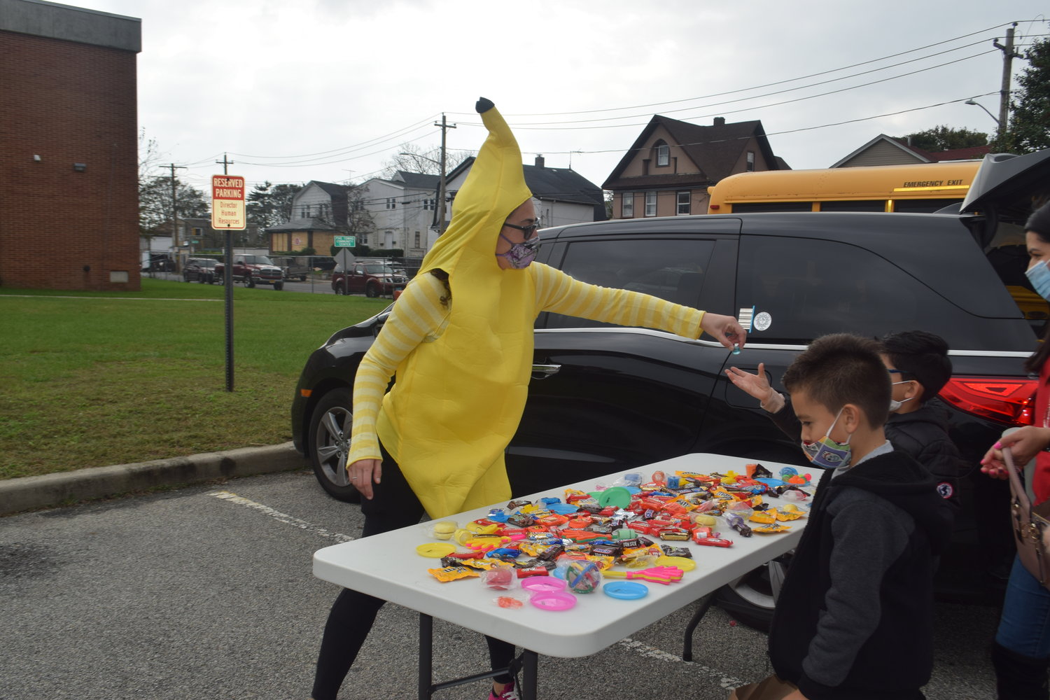 Rachel Tiran dressed as a banana and distributed candy from her 'ghost graveyard.'