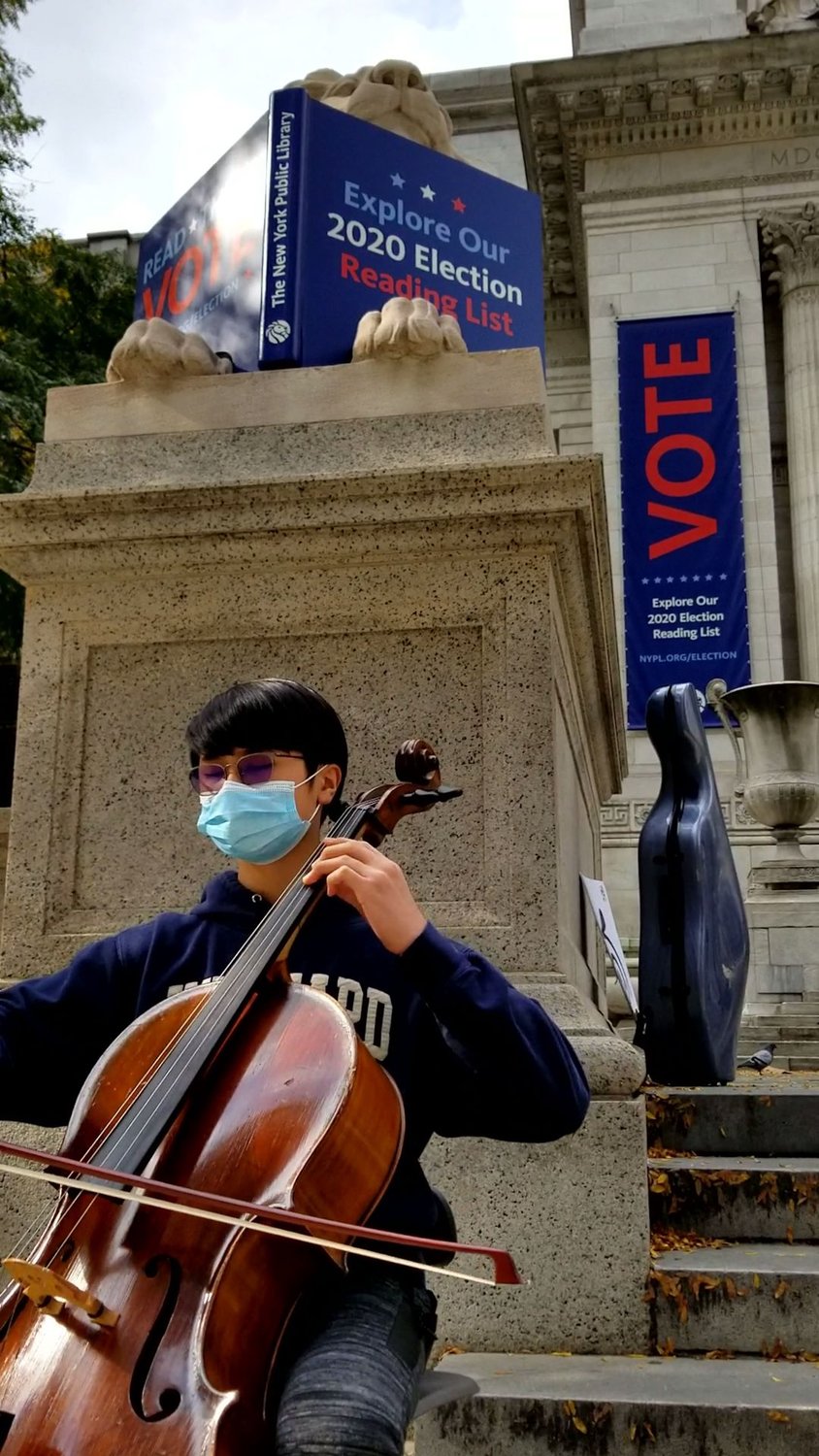Calhoun High School freshman Joseph Darcourt recently hauled his cello to the New York Public Library in Manhattan to raise money for Long Island Cares and The Harry Chapin Food Bank.