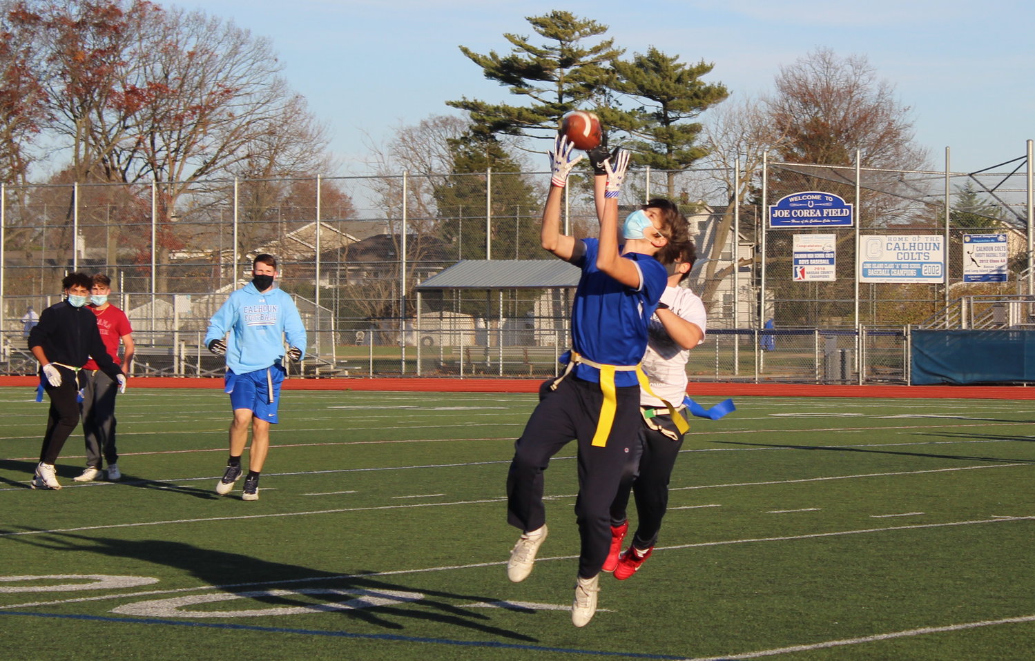 Senior TJ Rogers, the starting wide receiver for Sanford H. Calhoun High School’s football team, leapt to complete a pass during a flag football tournament benefiting the Bellmore-Merrick Community Cupboard on Nov. 24.