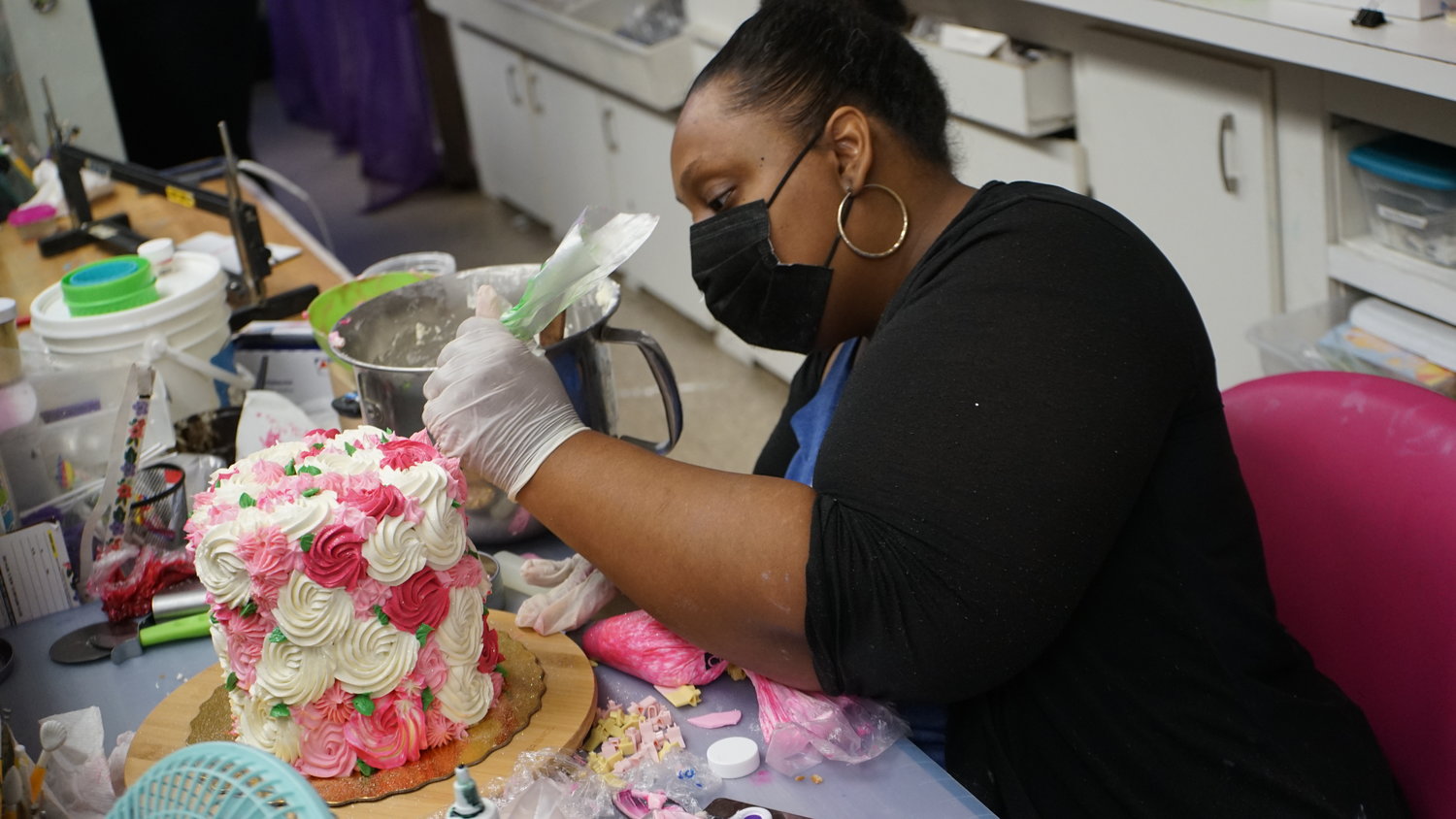 Caprice Campbell decorated a custom-ordered rosette cake at The Best Goodie Bag. Two of the shop’s owners are set to appear on the Netflix series “Sugar Rush” on Nov. 27.
