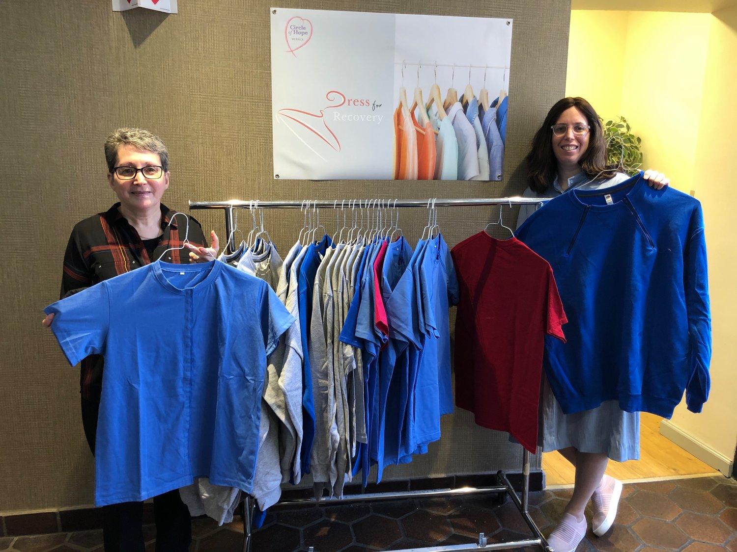 Breast cancer survivor Loraine Alderman, left, started Dress for Recovery, a clothing bank that will offer specially designed clothing for those undergoing breast cancer treatments. The initiative is part of the Chabad Center for Jewish Life’s Circle of Hope, which is run by Chanie Kramer, right.