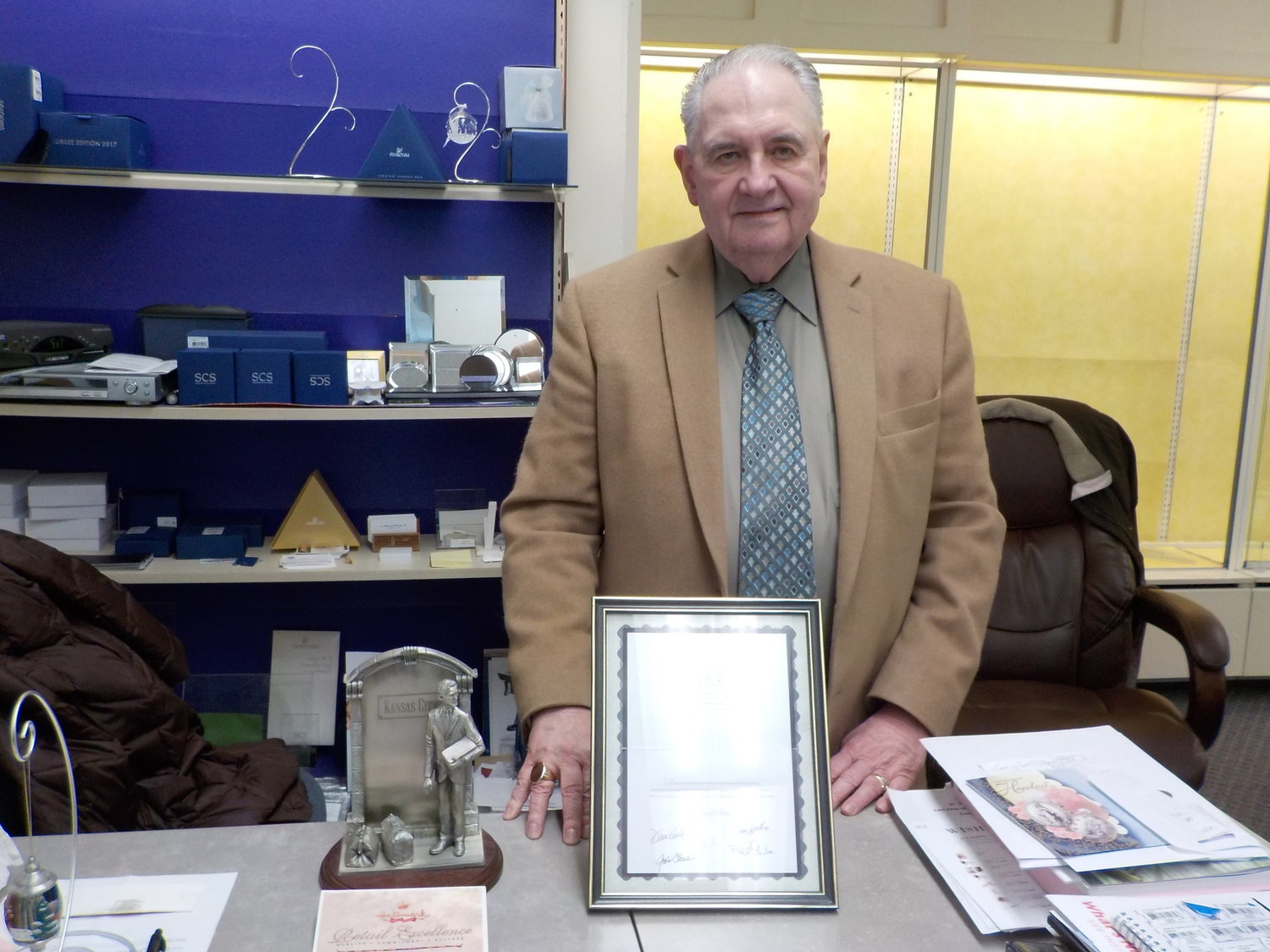 Gaylor displayed documents and awards that the Lyn Gift Shop had earned over the years for excellence in retail as a Hallmark store. He died on Nov. 28 at 79, but leaves behind a legacy in the village.