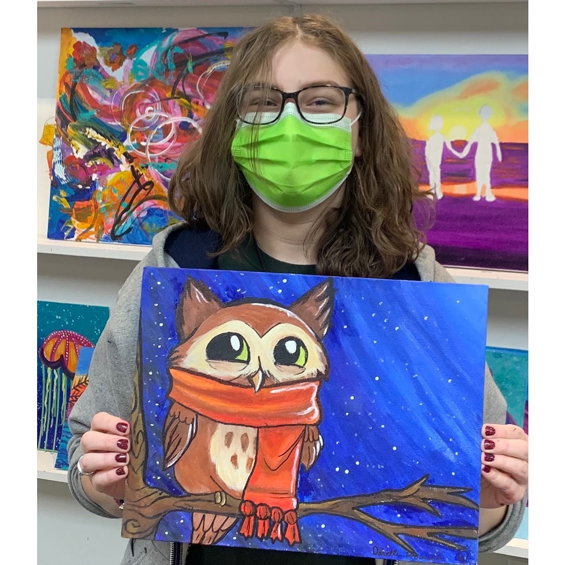 Daniella Procaccini, 15, with her canvas painting.