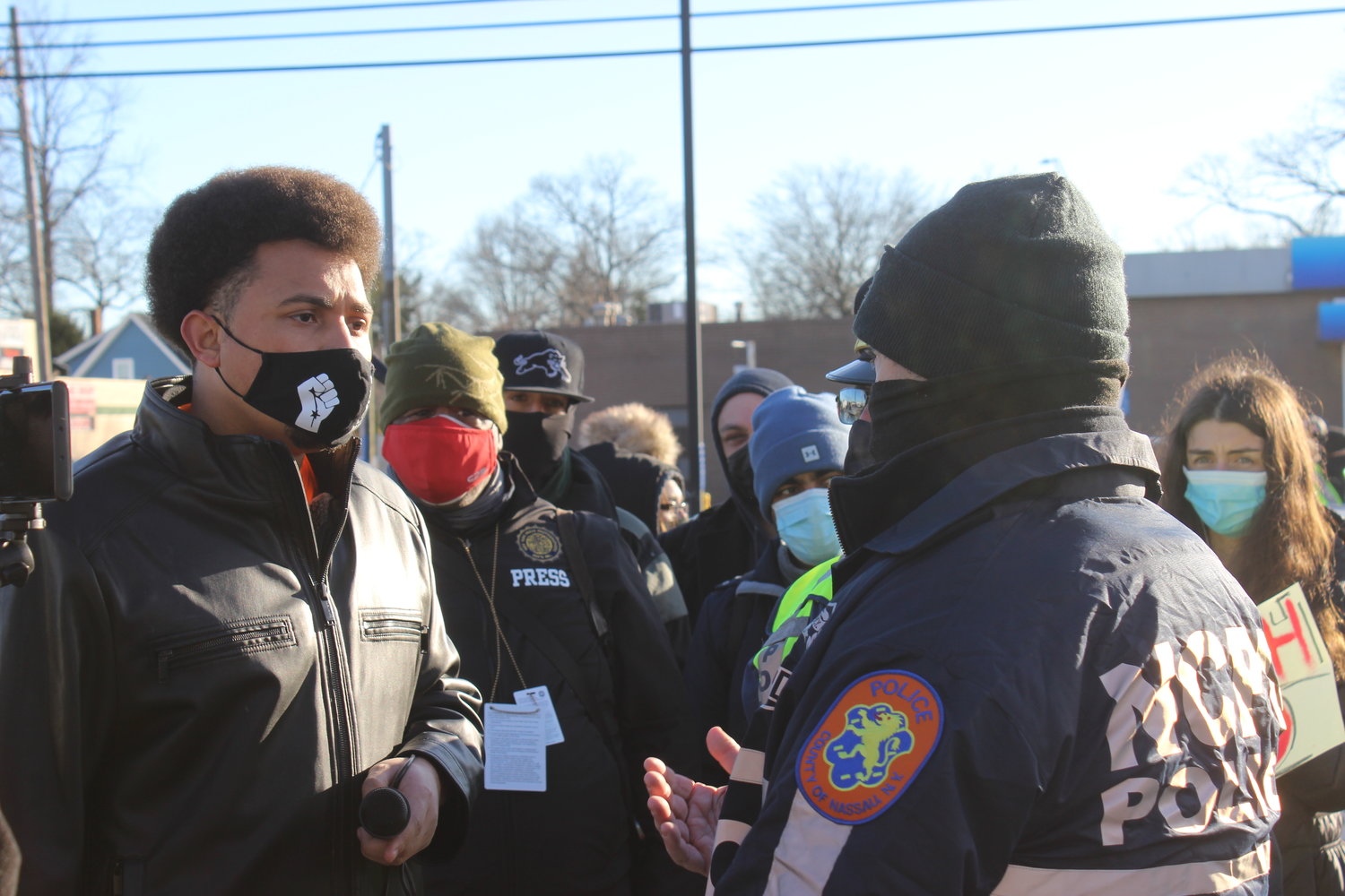 Tuosto spoke with Nassau County police officers before the march.