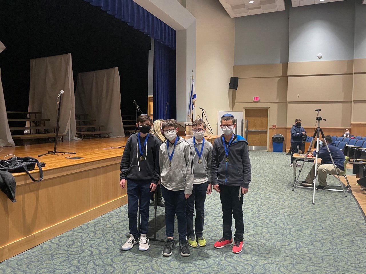 The winning exhibit at HALB’s History Day Fair was ‘Breaking the Enigma Code,’ by Menachem Porter, left, Binyamin Posner, Yoni Schochet and Ethan Ostrow.