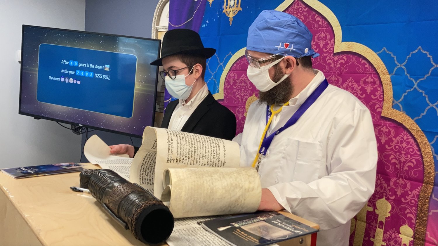 Rabbi Shimon Kramer, of the Chabad Center for Jewish Life, in Merrick, delivered an in-person Megillah reading to congregants in celebration of Purim.