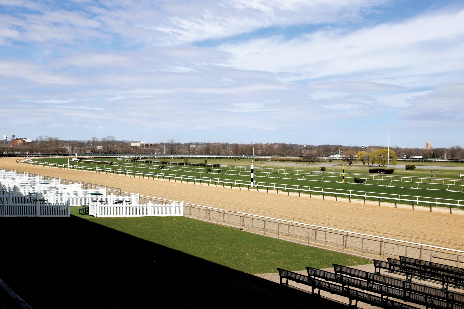 New York Racing Association officials are considering winterizing the track at Belmont Park, and reducing the size of the grandstand so that it no longer casts a shadow over the track.