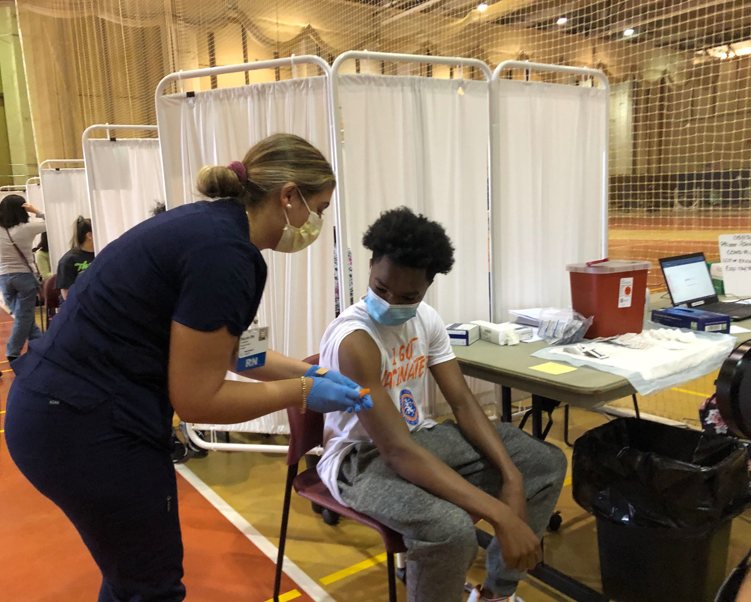 Myles Hollingsworth, 16, of Freeport, was vaccinated on May 13 at the Nassau Community College vaccination site for adolescents.