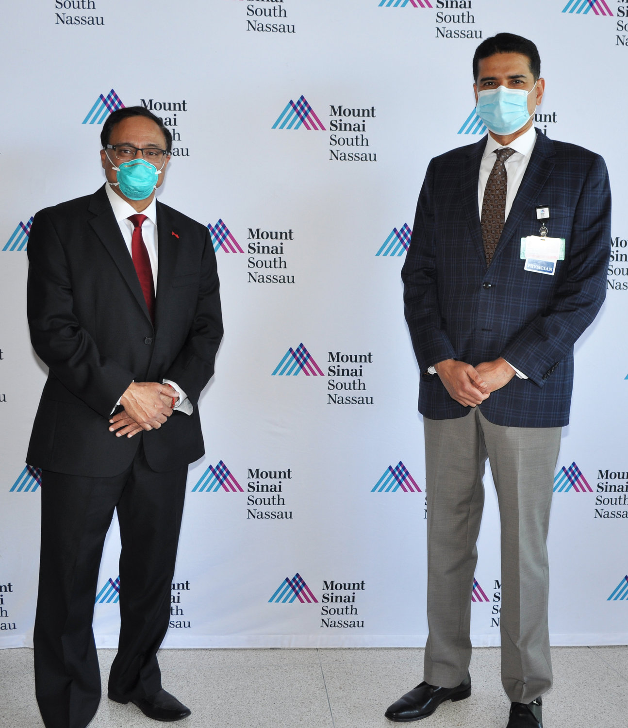 Dr. Abhay Malhotra, president of American Association of Physicians of Indian Origin, Queens Long Island, left, and Dr. Rajiv Datta, chair of the Department of Surgery at Mount Sinai South Nassau, spearheaded the effort.
