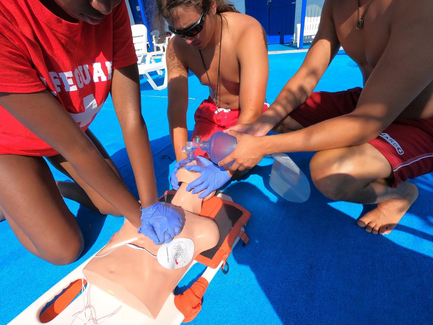 Lifeguard trainees learn how to administer cardio pulmonary resuscitation at Lifeguard Training NY.