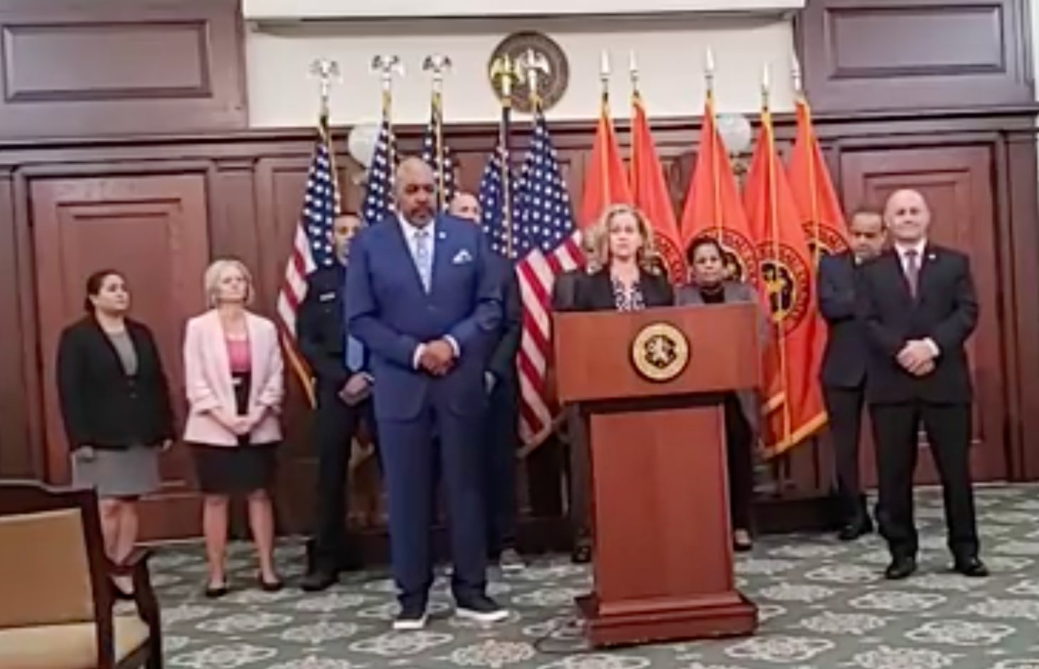 Bishop Lionel Harvey, center, joins Nassau County Executive Laura Curran, at lectern, who announced the creation of a new police diversity committee.