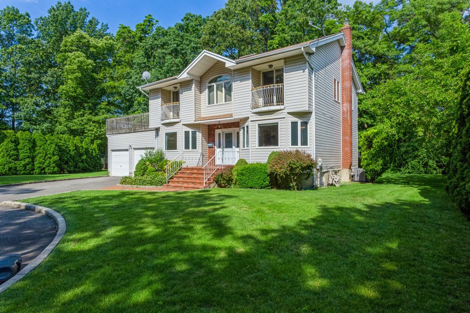 As the weather heats up, so does the real estate market. Local agents say they believe that many homes will sell, such as this one on Bedell Terrace in West Hempstead.