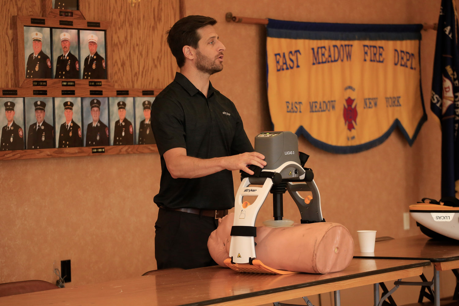 Ryan Pinnix, the Stryker rep, gives a refresher demo of the new CPR technology.