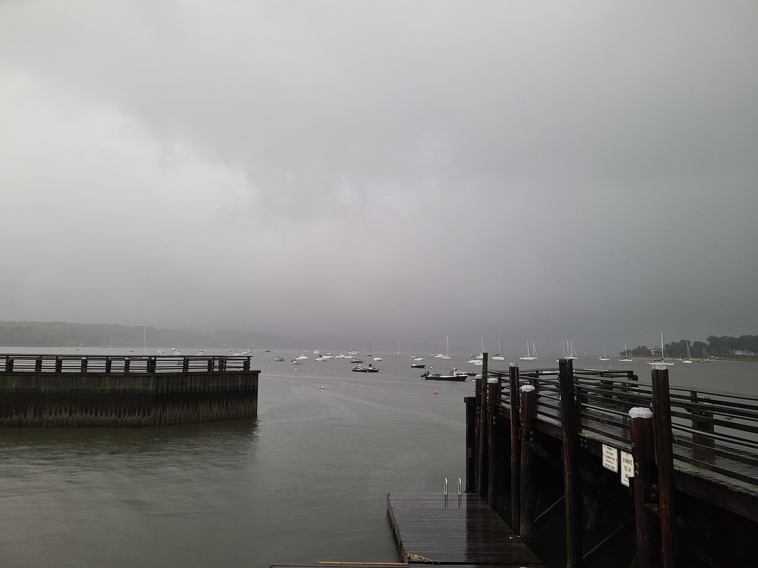 Bill Fetzer saw ominous clouds at Theodore Roosevelt Park Marina in Oyster Bay on Thursday.