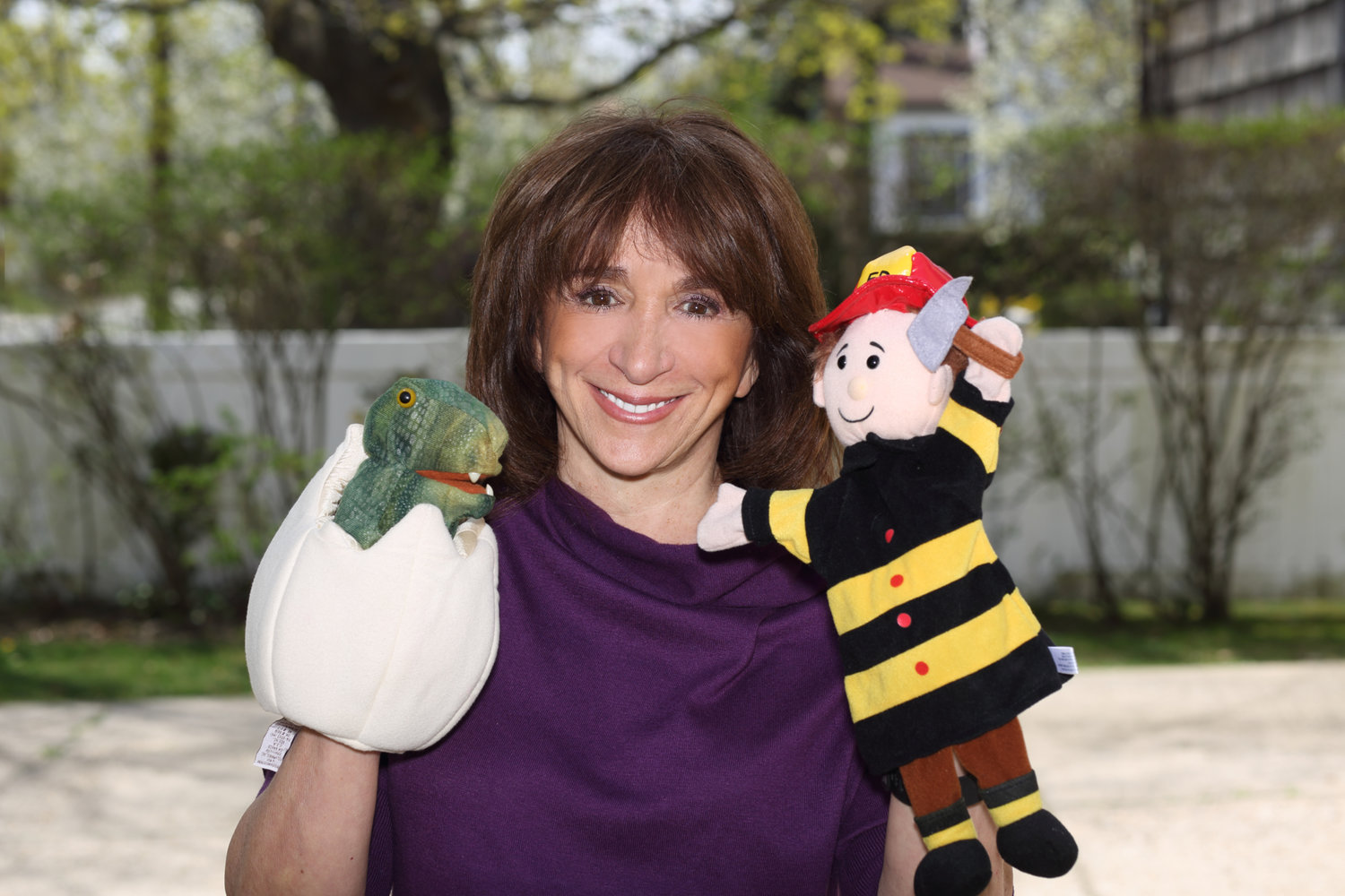 Cedarhurst child psychologist Dr. Laurie Zelinger with the puppets she uses when counseling children.