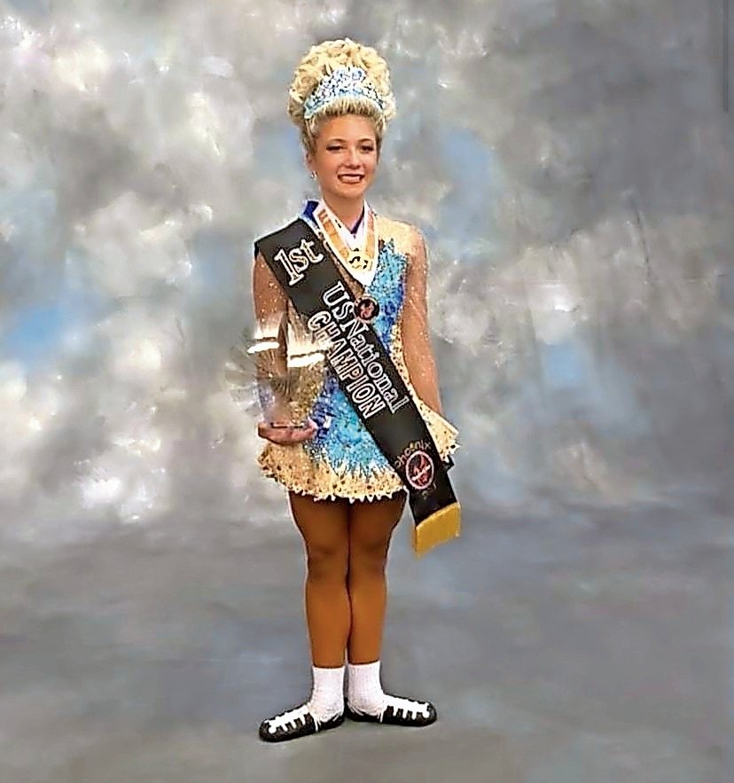 McGlynn with her sash and trophy after her age-group win.