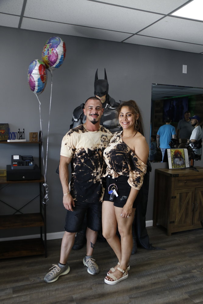 Gotham Barbershop owners Danny Torres and his wife Melanie Caloger-Torres.