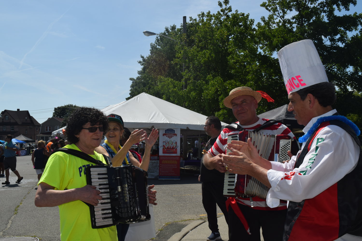 The Pizza Dance band of Amelio Morelli, left, Nino Gugliemo and Tony Modica performed throughout the fair.